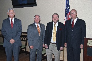 At the November meeting, Dave Grundies (l), Southwestern regional vice president, and Wickstrom (2nd from r) thank Kent Schneider (r), president and chief executive officer, and Lt. Gen. John A. Dubia, USA (Ret.), executive vice president, both from AFCEA International, for speaking at the luncheon.